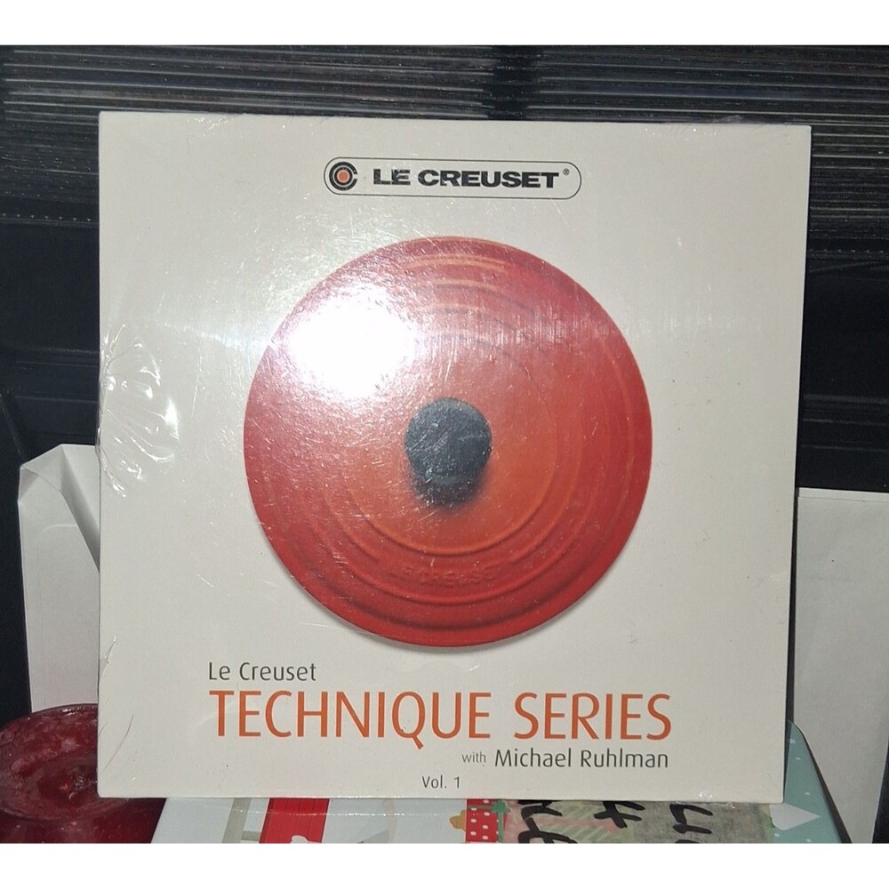 Le Creuset Technique Series Vol. 1 cookbook or DVD set featuring Michael Ruhlman
